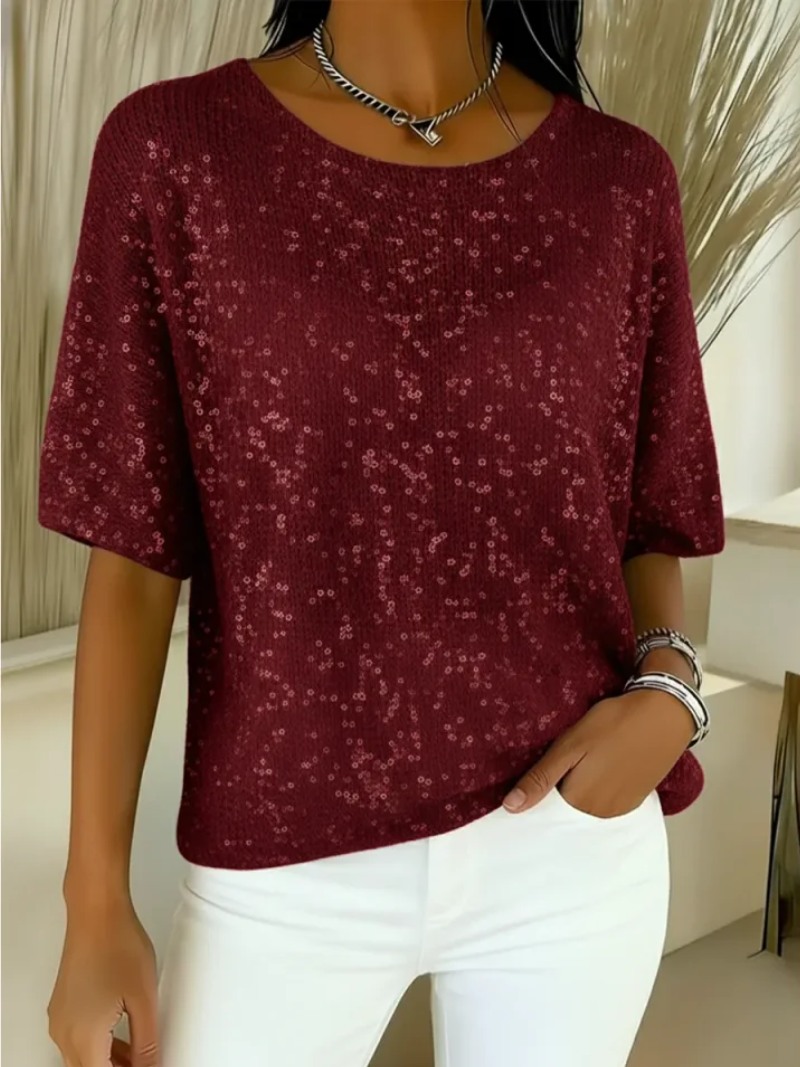 Livia – Elegant top med subtil glans